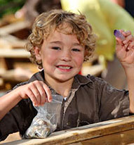 Young Boy Mining for Gems