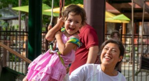 girl having fun on Tykes course