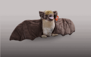 a stuffed animal bat with wings